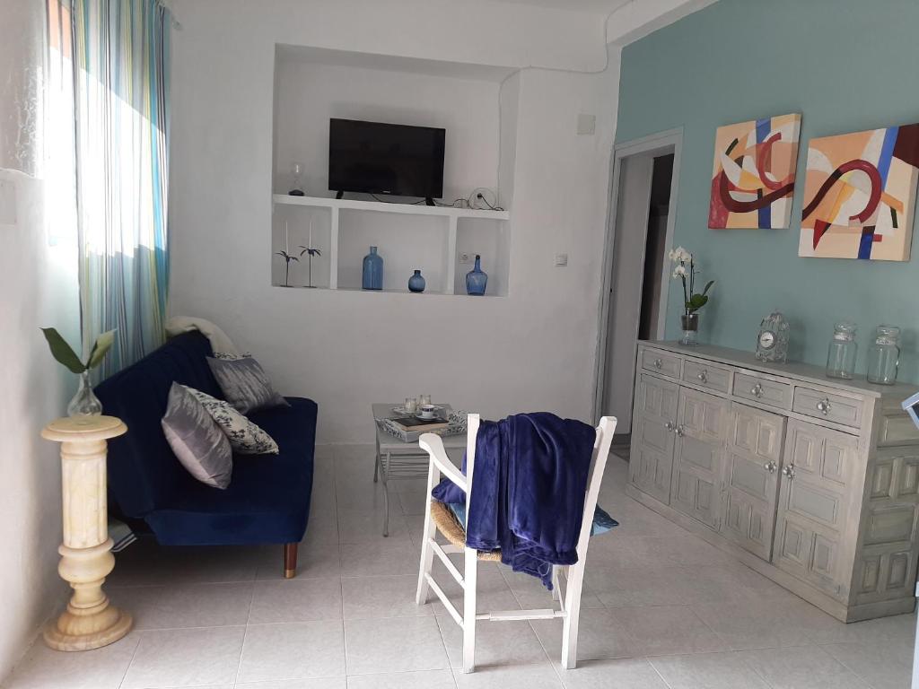 A television and/or entertainment centre at CASA RURAL "ECCEHOMO de BORJA"