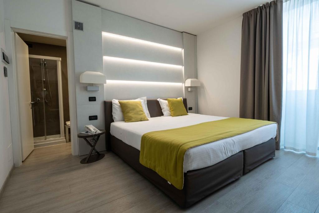Postel nebo postele na pokoji v ubytování La Pieve Hotel