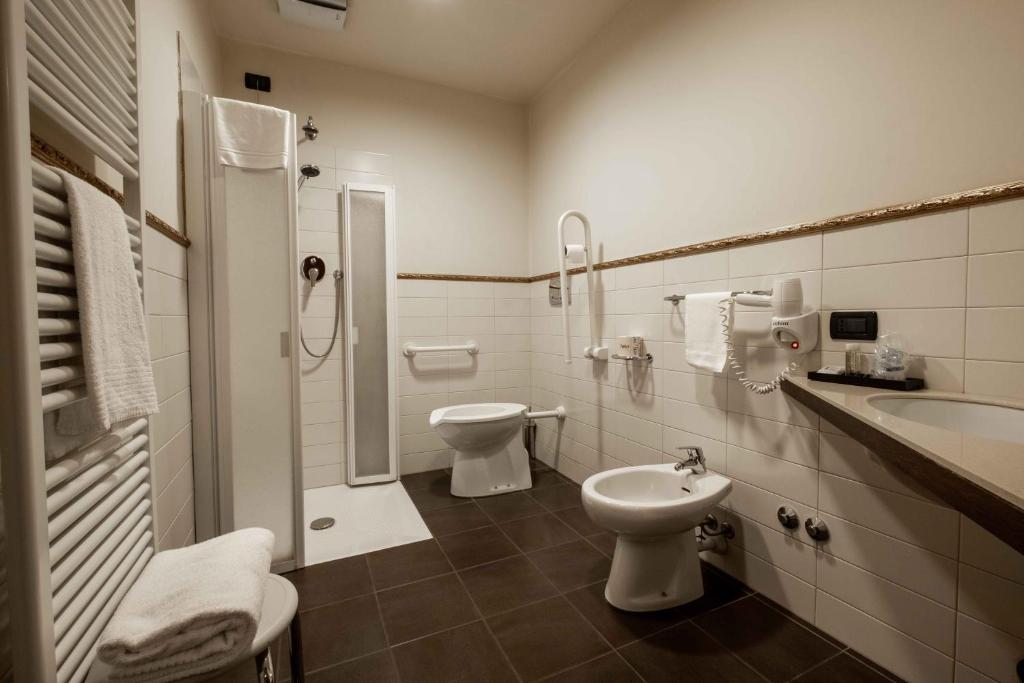 Koupelna v ubytování La Pieve Hotel