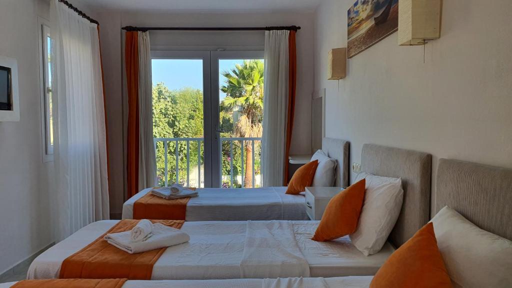 Postel nebo postele na pokoji v ubytování Dalyan Villa Amazon