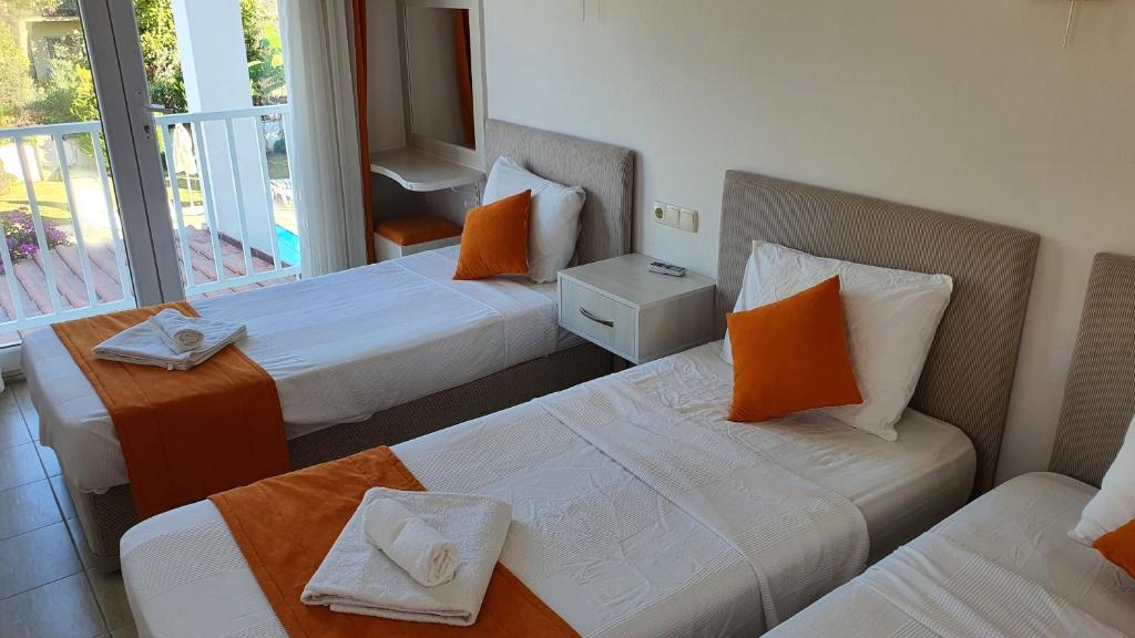 Postel nebo postele na pokoji v ubytování Dalyan Villa Amazon