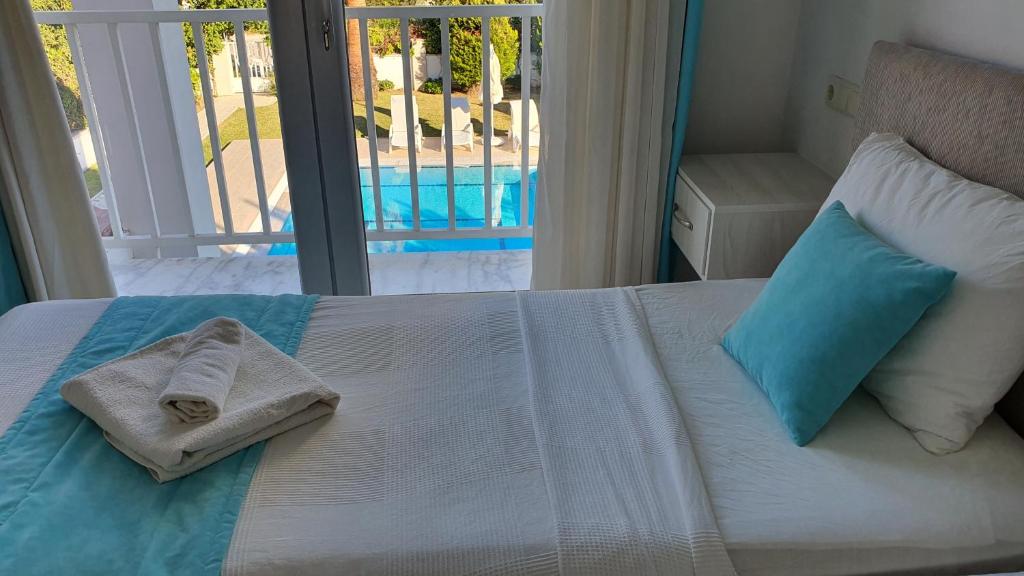 Postel nebo postele na pokoji v ubytování Dalyan Villa Amazon