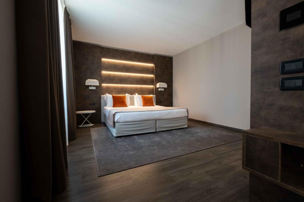 Postel nebo postele na pokoji v ubytování La Pieve Hotel