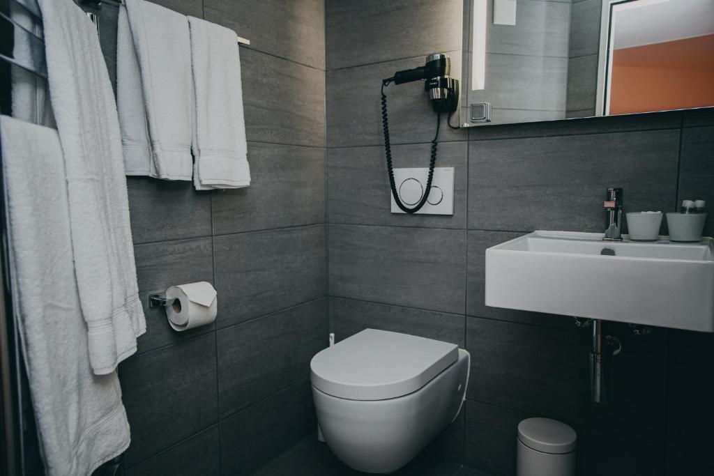 Koupelna v ubytování Hotel Dakota