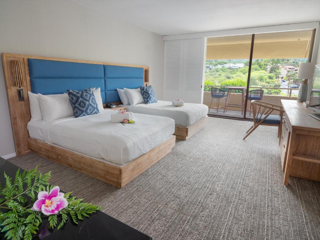 Postel nebo postele na pokoji v ubytování Royal Kona Resort