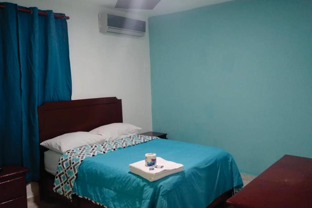 Postel nebo postele na pokoji v ubytování Hostal Magisterial Santo Domingo