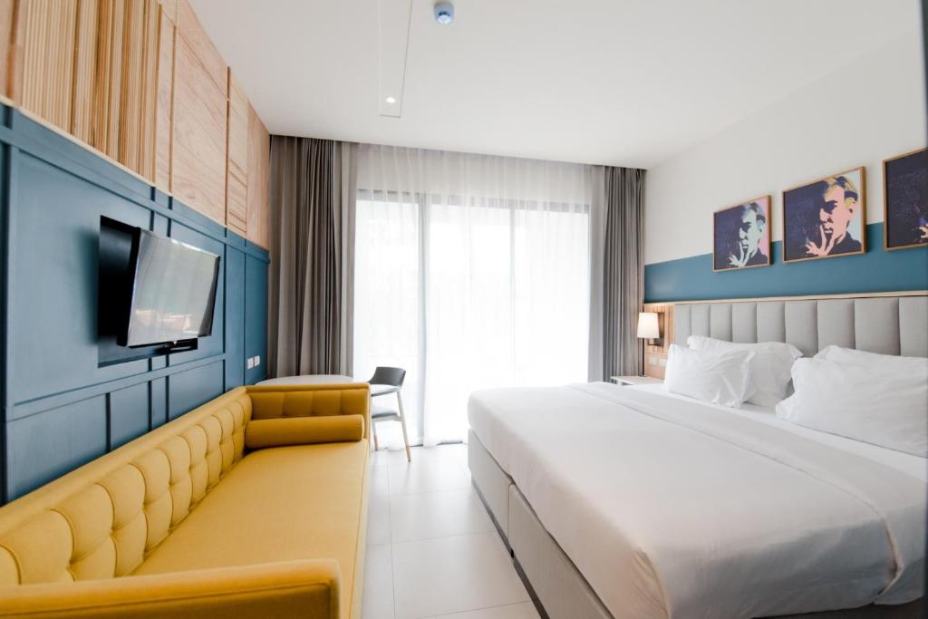 Postel nebo postele na pokoji v ubytování Sugar Marina Hotel - ART - Karon Beach