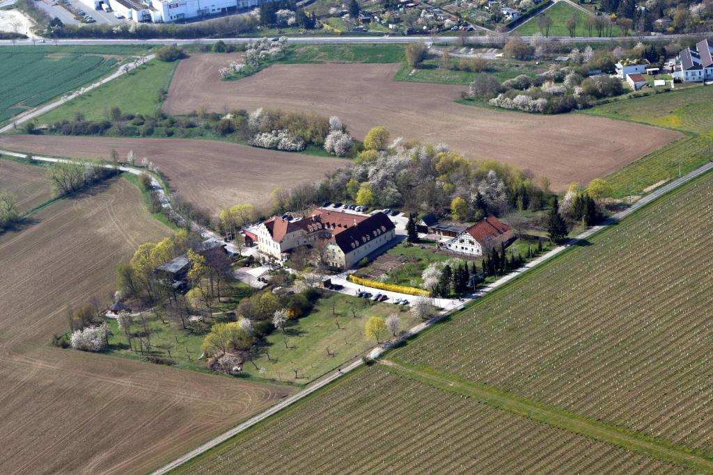 an aerial view of a house in a field at Konsumhotel Dorotheenhof Weimar in Weimar