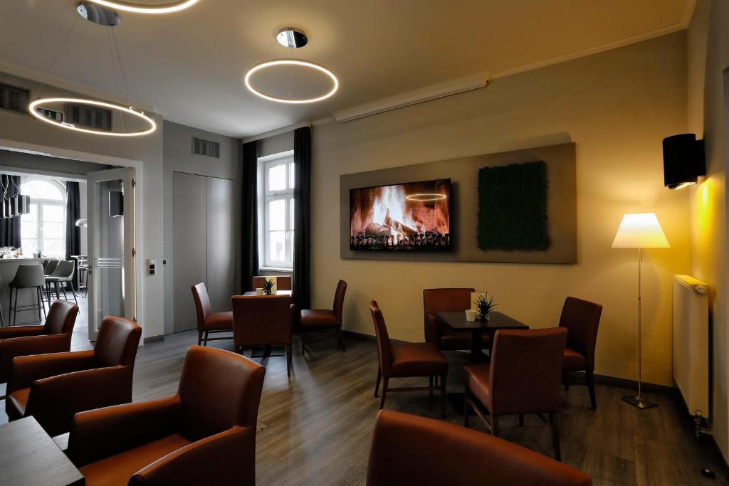 TV o dispositivi per l'intrattenimento presso Konsumhotel Dorotheenhof Weimar