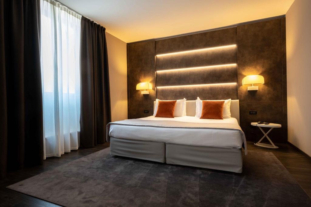 Postel nebo postele na pokoji v ubytování La Pieve Hotel