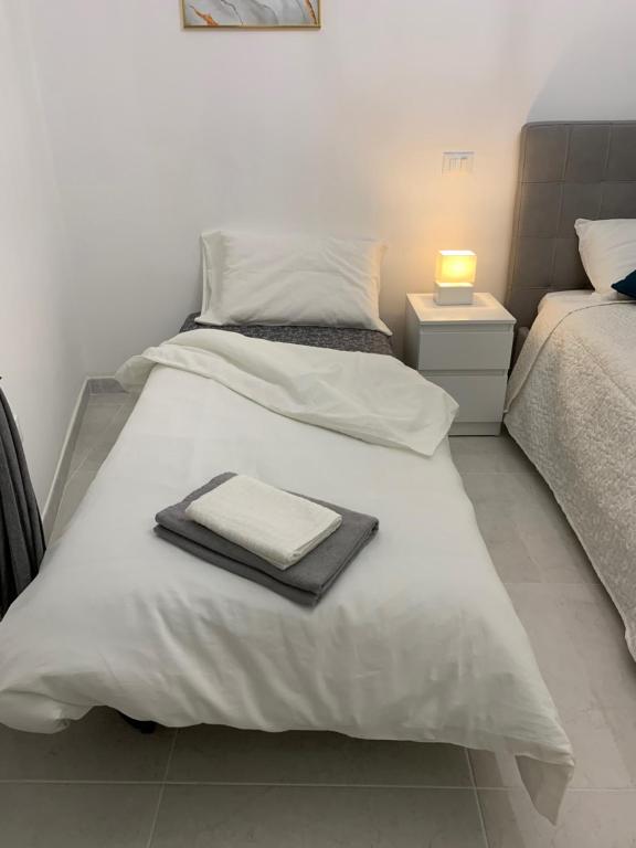 Posteľ alebo postele v izbe v ubytovaní Luxury Apartment in Rome Countryside - Francigena