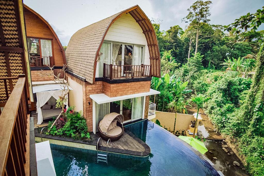 Bazén v ubytování Tanamas Villas Ubud by Best Deals Asia Hospitality nebo v jeho okolí