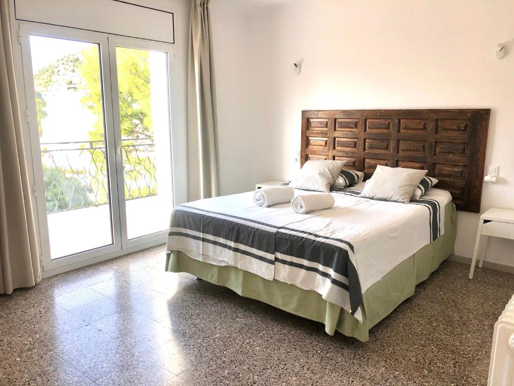 Postel nebo postele na pokoji v ubytování VILLA ALMADRABA PARA 16 PERSONAS