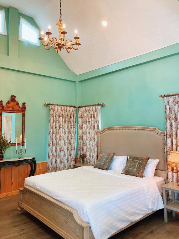 Postel nebo postele na pokoji v ubytování Baroque Boutique Resort