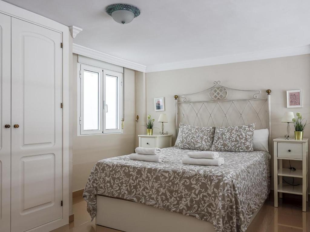 Posteľ alebo postele v izbe v ubytovaní Sueños de Sevilla duplex a calidades