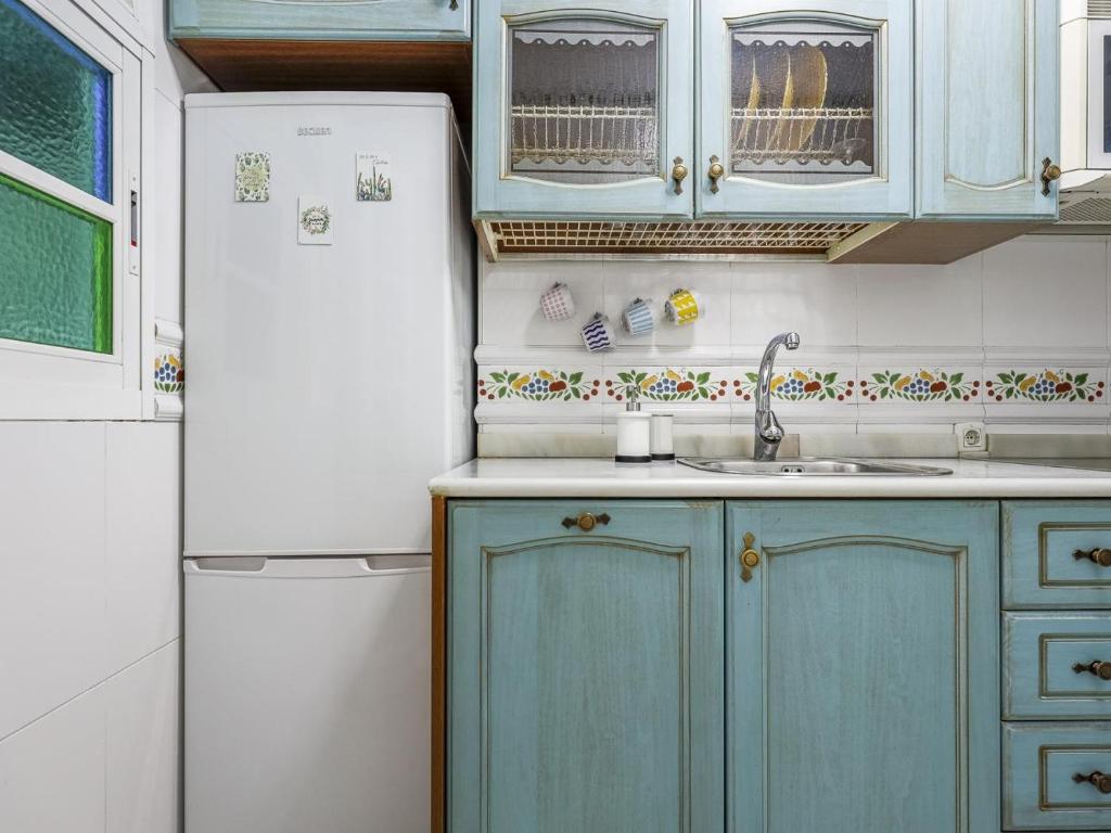 Kuchyňa alebo kuchynka v ubytovaní Sueños de Sevilla duplex a calidades