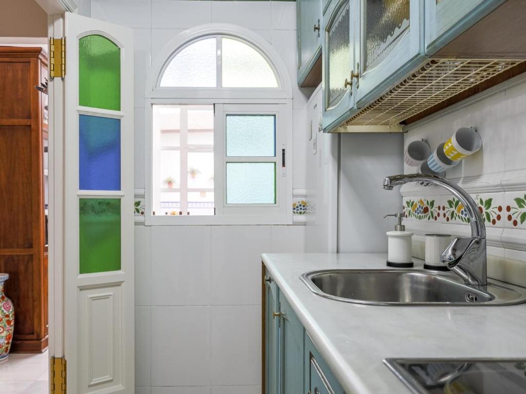 Kuchyňa alebo kuchynka v ubytovaní Sueños de Sevilla duplex a calidades