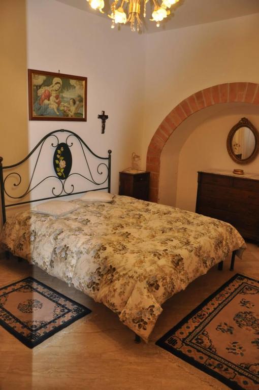 Postel nebo postele na pokoji v ubytování Basilicata Host to Host - Storia, mare e relax - la casa che cercate -