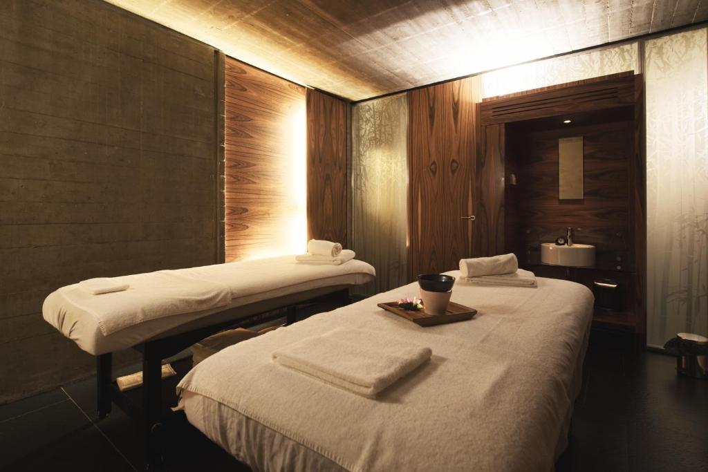 Katil atau katil-katil dalam bilik di DUPARC Contemporary Suites