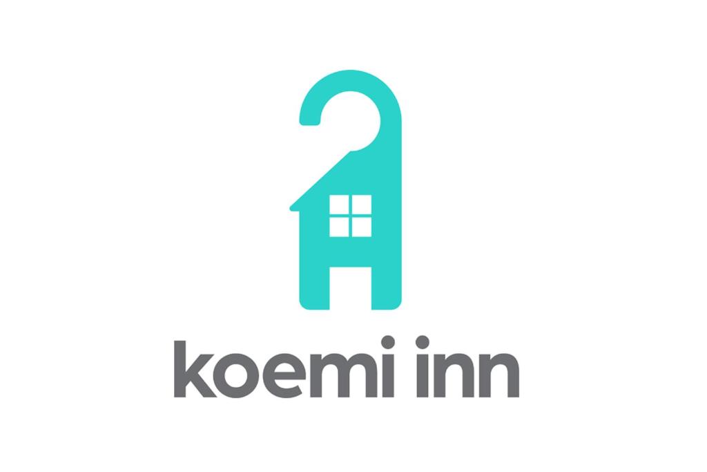 a logo for a company with a question mark at Koemi in Kempton Park