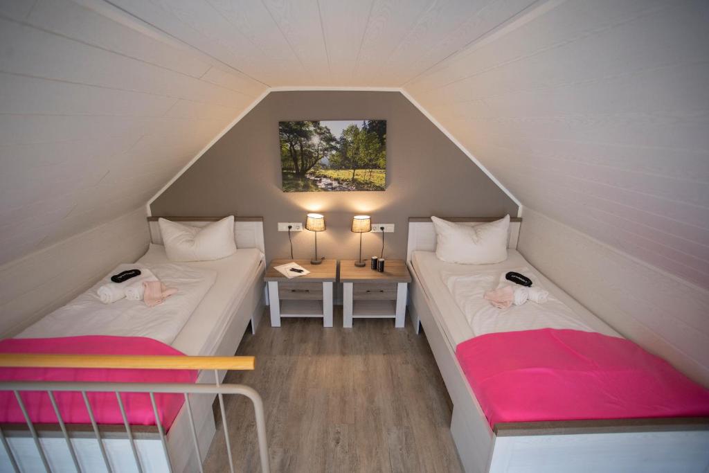 Postel nebo postele na pokoji v ubytování Das Loft Hotel Willingen