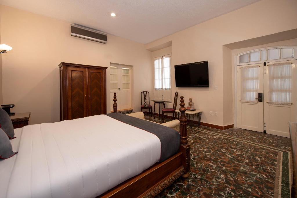 TV a/nebo společenská místnost v ubytování Hotel Senorial