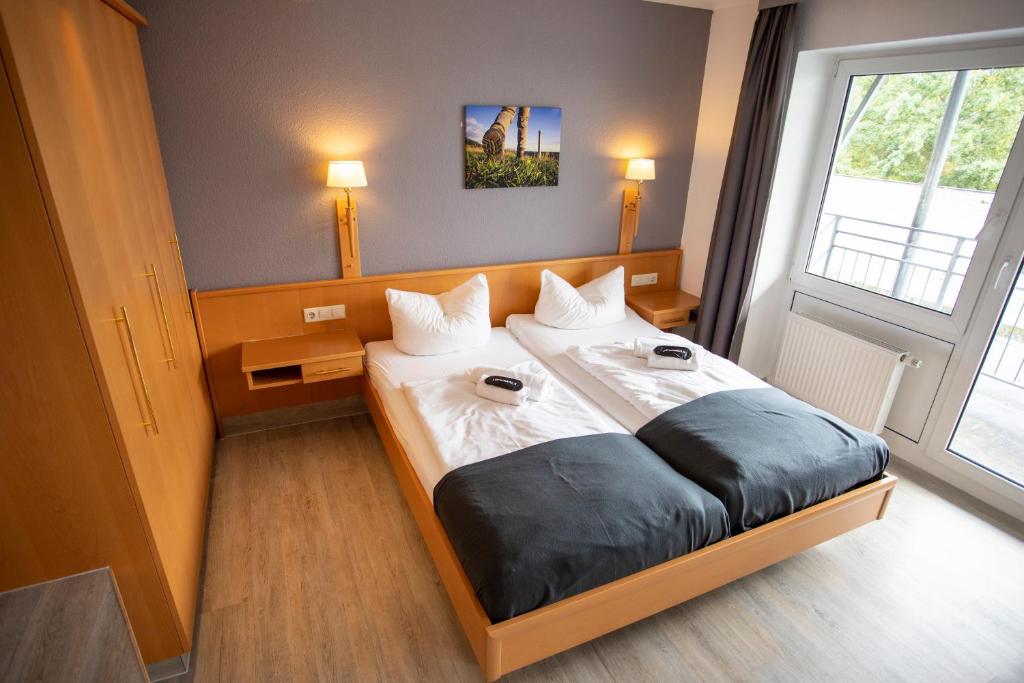 Postel nebo postele na pokoji v ubytování Das Loft Hotel Willingen
