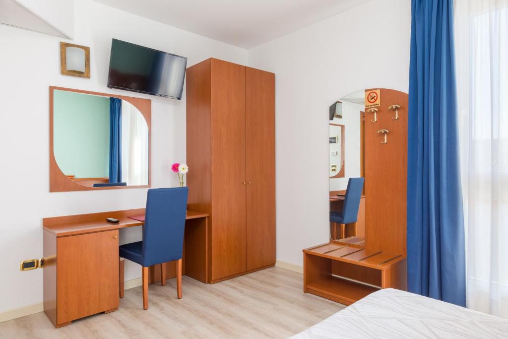 Postel nebo postele na pokoji v ubytování Hotel Palladio
