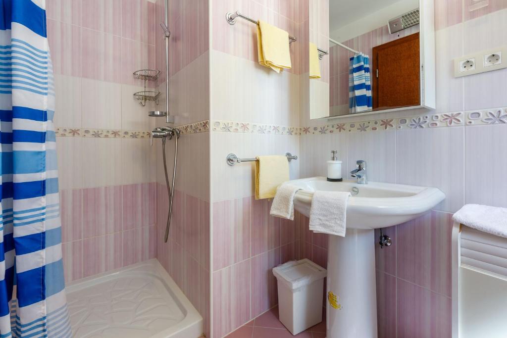 Koupelna v ubytování Apartments Robic