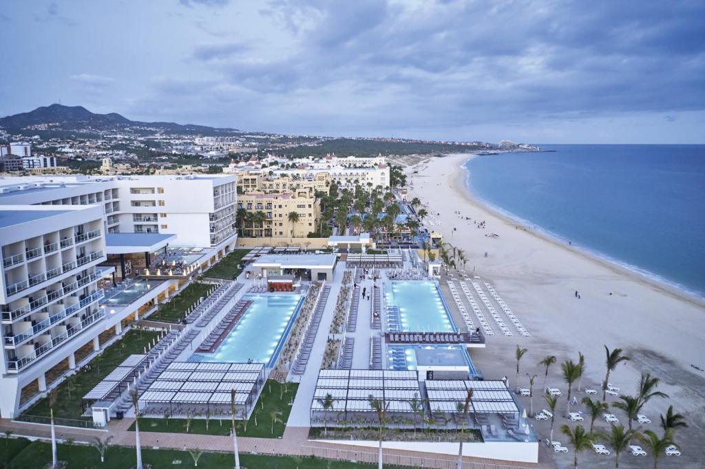 an aerial view of a beach and a resort at Riu Palace Baja California - Adults Only - All Inclusive in Cabo San Lucas