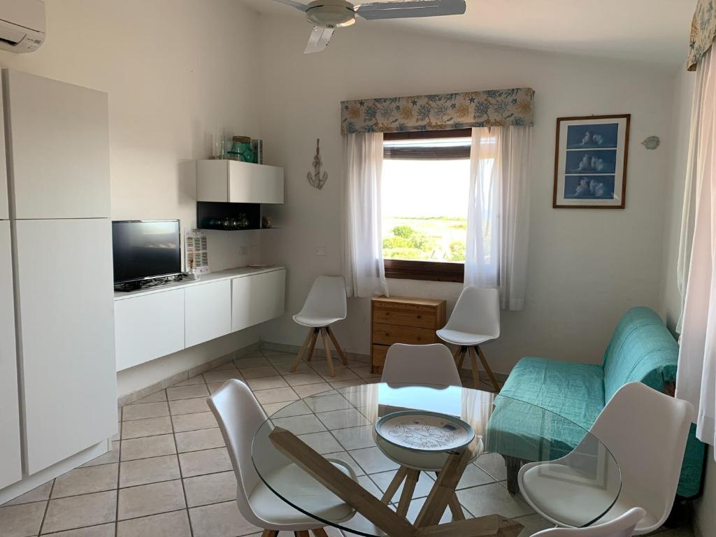 TV a/nebo společenská místnost v ubytování Sant'Elmo Holiday Residence