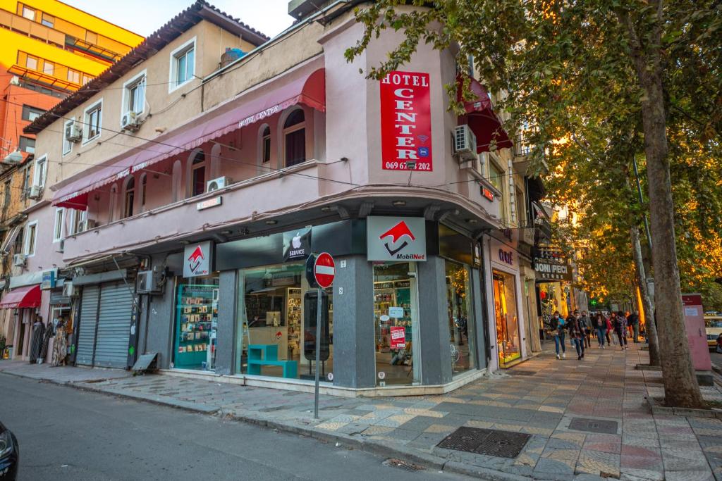 a building on the side of a street at Center Elite Tirana in Tirana