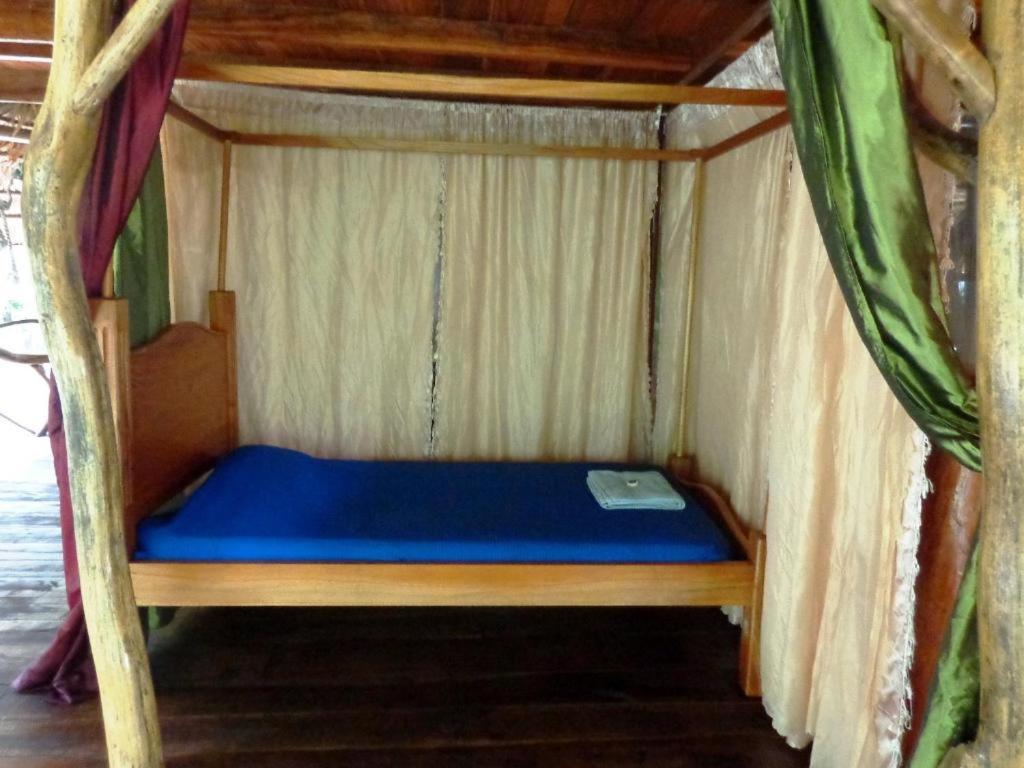 Postel nebo postele na pokoji v ubytování Casa Moabi