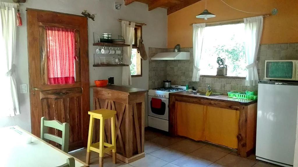 Kuchyň nebo kuchyňský kout v ubytování Cabañas Las Nativas