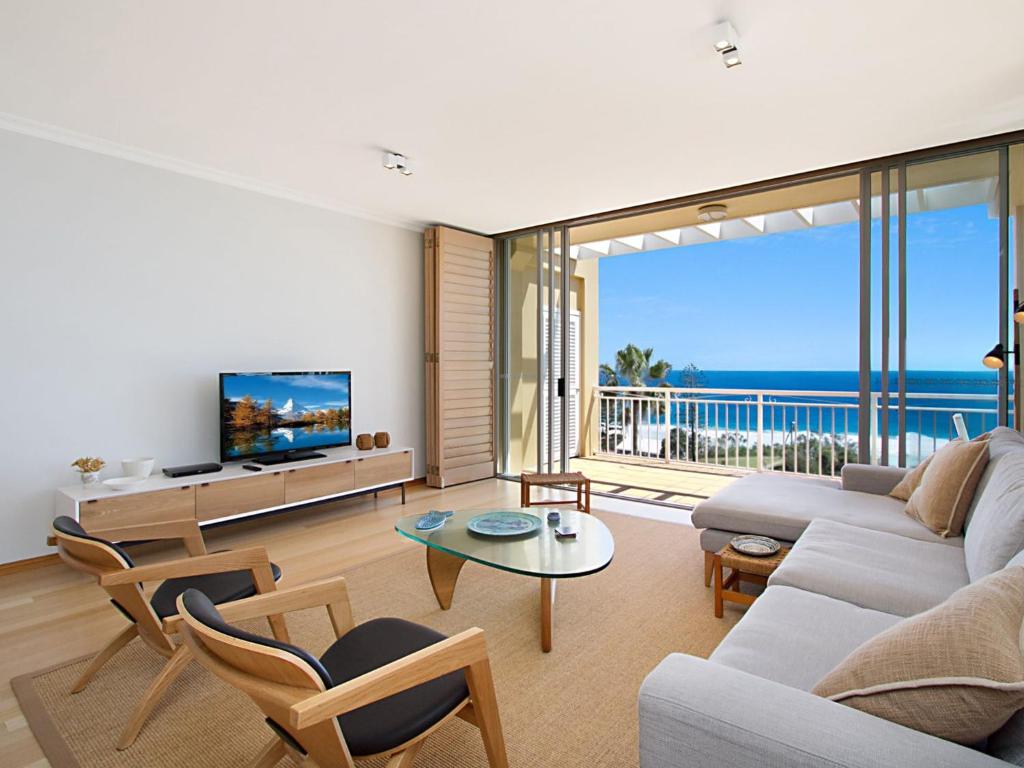 a living room with a view of the ocean at Orion Unit 7 in Gold Coast