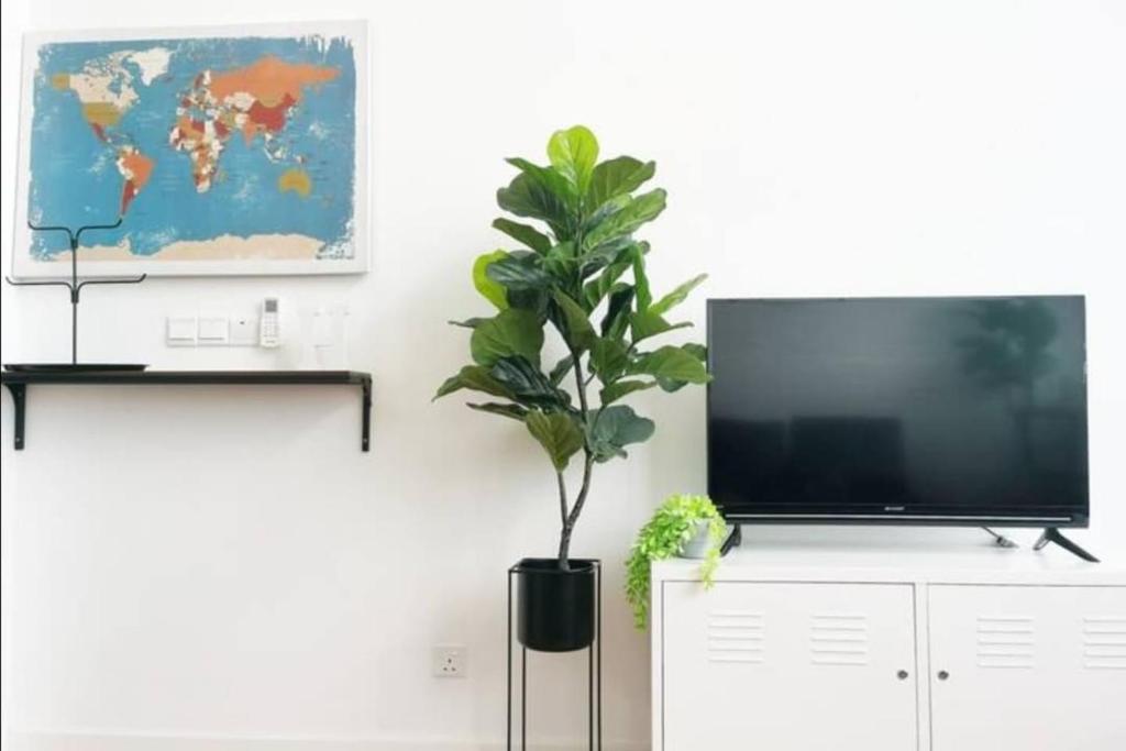 TV a/nebo společenská místnost v ubytování The Hub SS2 - 1 Bedroom Suite