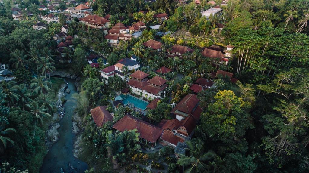 an aerial view of a resort with a river at Bali Spirit Hotel and Spa, Ubud in Ubud