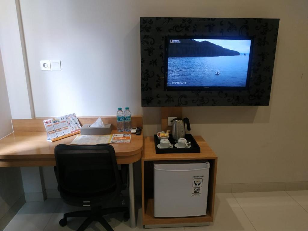 Una cocina o cocineta en Choice City Hotel