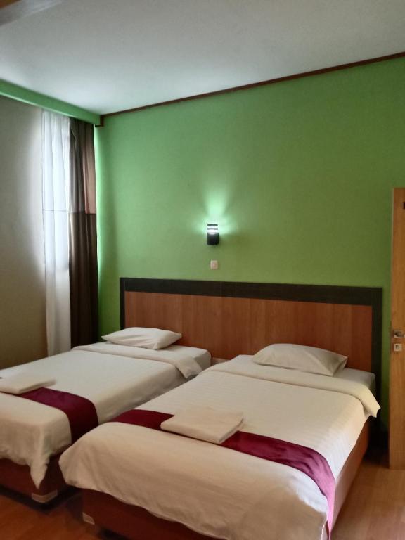 Postel nebo postele na pokoji v ubytování The New Orlinds Guest House
