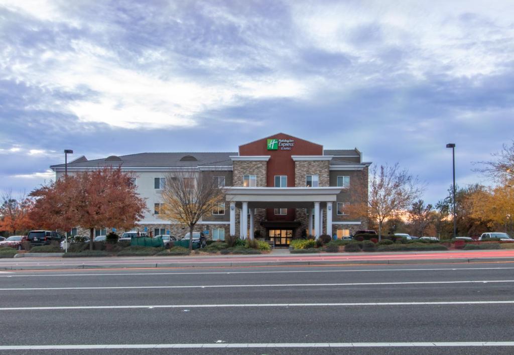 a large building on the side of a street at Holiday Inn Express Hotel & Suites Roseville - Galleria Area, an IHG Hotel in Roseville