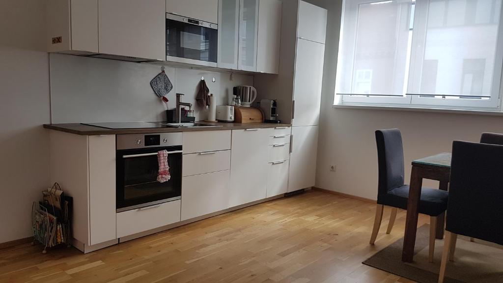 Kuchyň nebo kuchyňský kout v ubytování Moderne Maisonette mit Terrasse