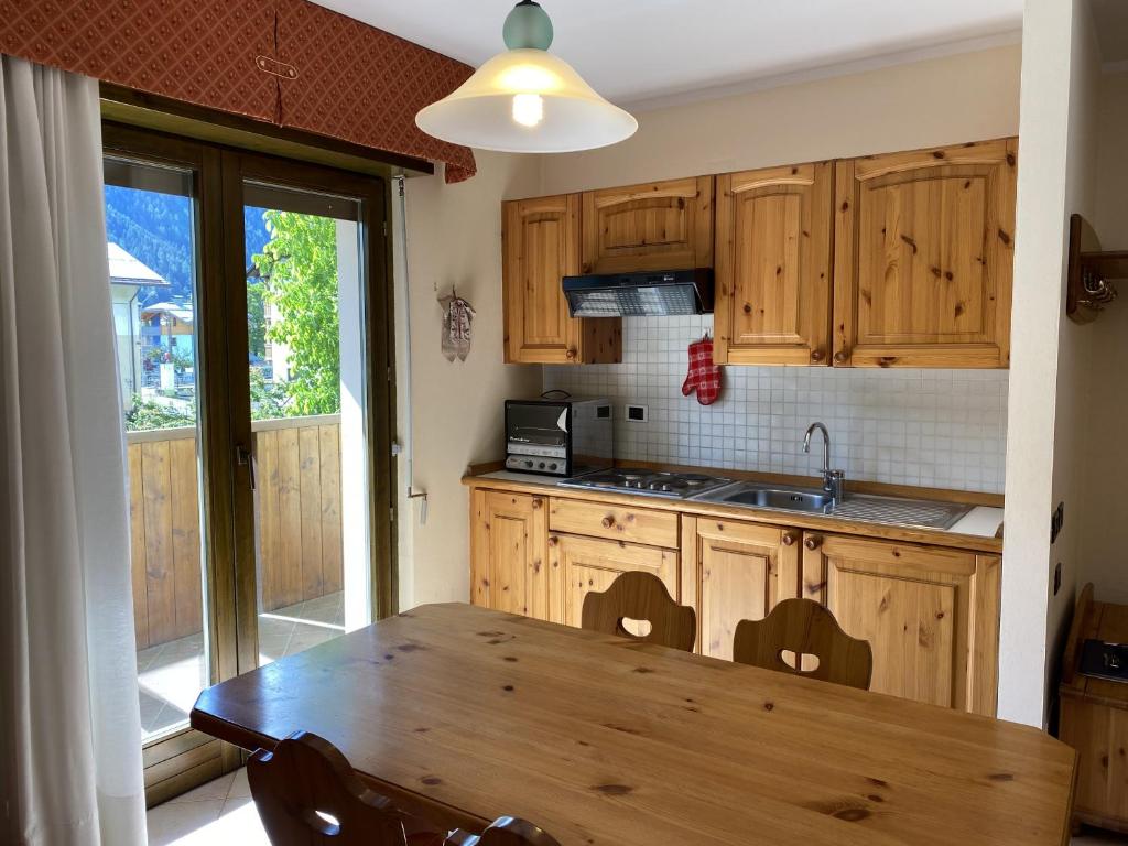 Kuchyň nebo kuchyňský kout v ubytování Condominio Gaiolin