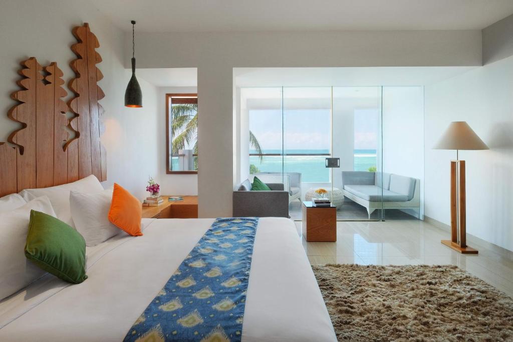 Postel nebo postele na pokoji v ubytování Hotel Nikko Bali Benoa Beach