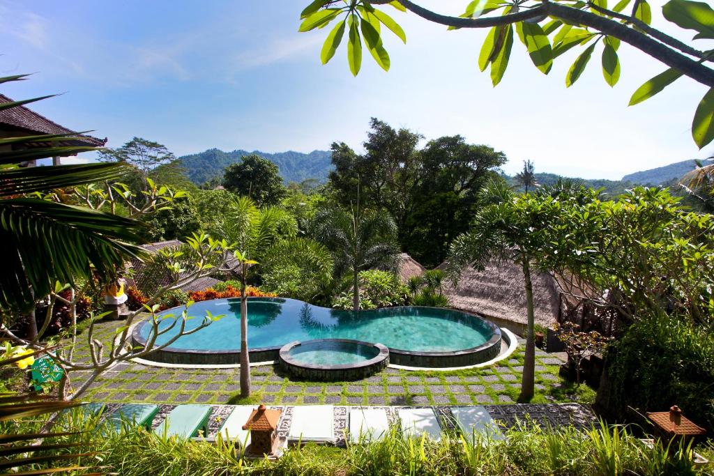 Utsikt över poolen vid Uma Agung Villa eller i närheten