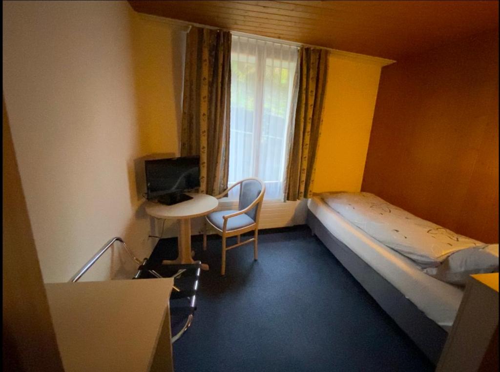 Postel nebo postele na pokoji v ubytování Dinh Residence