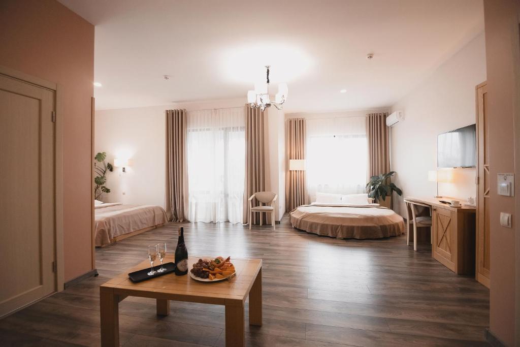 Postel nebo postele na pokoji v ubytování Sofia Hotel