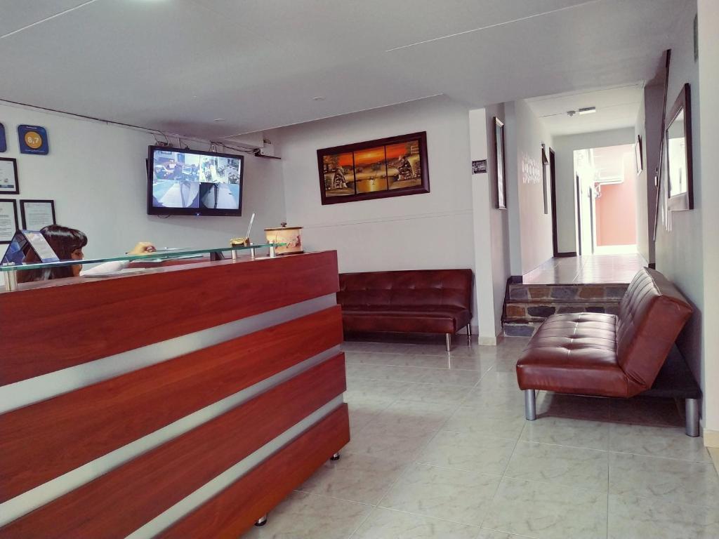 TV a/nebo společenská místnost v ubytování Hotel Confort Bogota