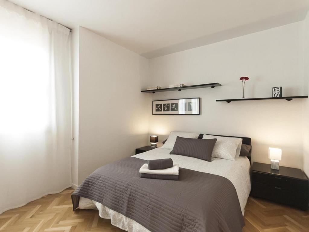 Postel nebo postele na pokoji v ubytování Lets holidays apartment in Sant Martí