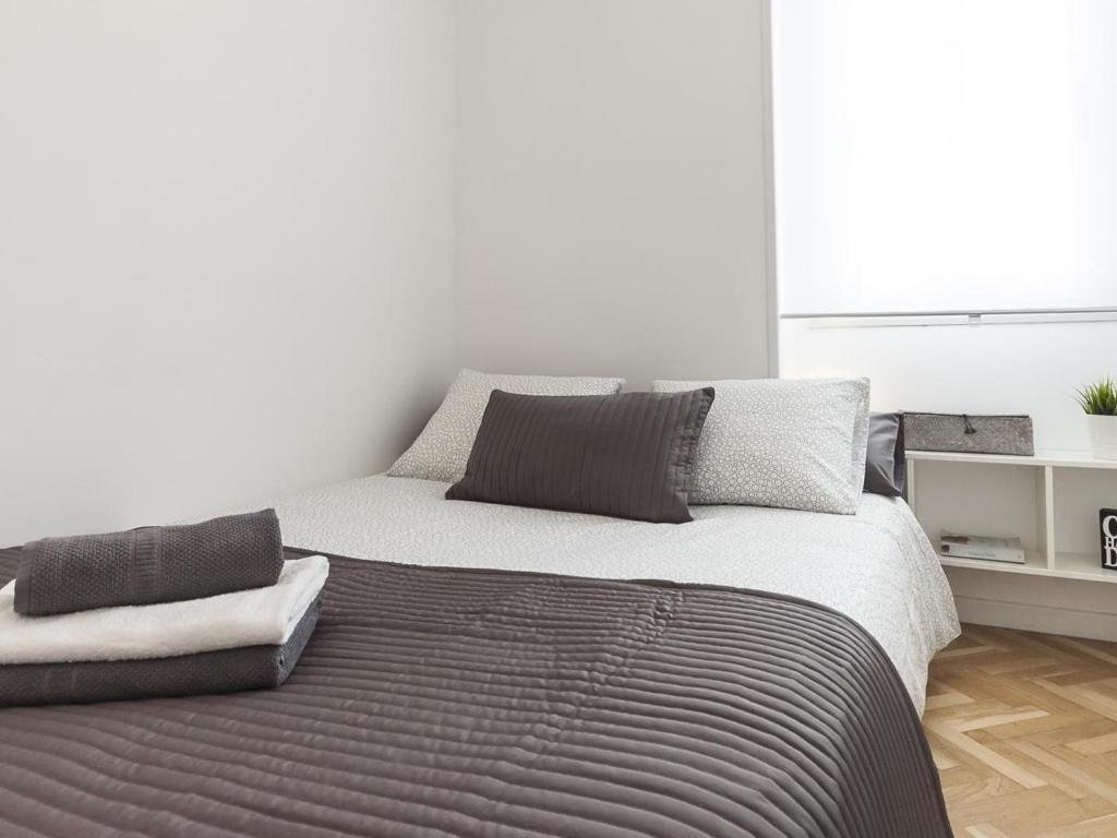 Postel nebo postele na pokoji v ubytování Lets holidays apartment in Sant Martí