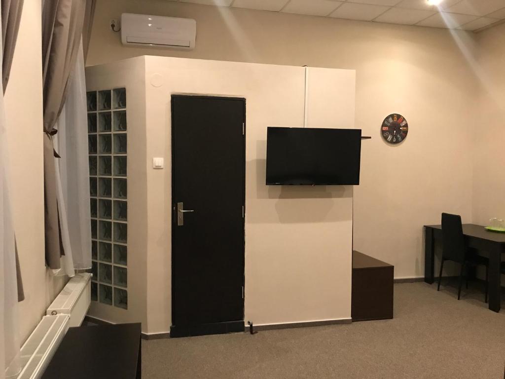 TV a/nebo společenská místnost v ubytování Casa IDA 1896